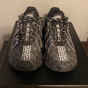 Versace women’s Trigreca sneaker. Size 38. (8). Black and silver